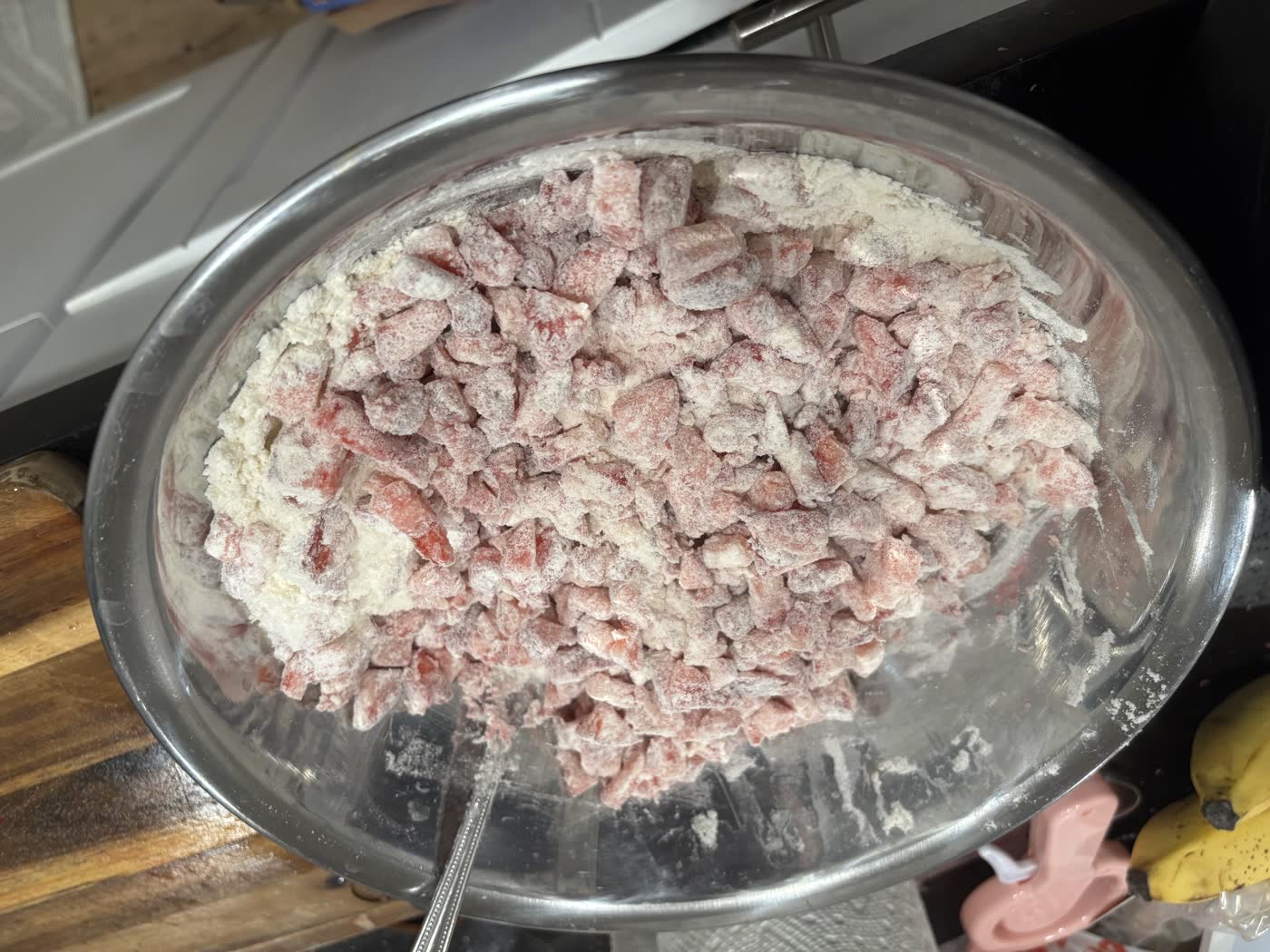 Chopped strawberries coated in flour